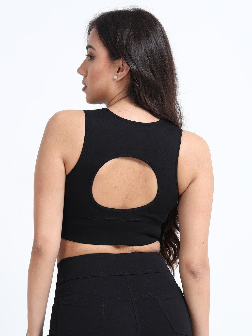 Black cutout sports bra back view showing cutout panel design