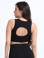 Black cutout sports bra back view showing cutout panel design