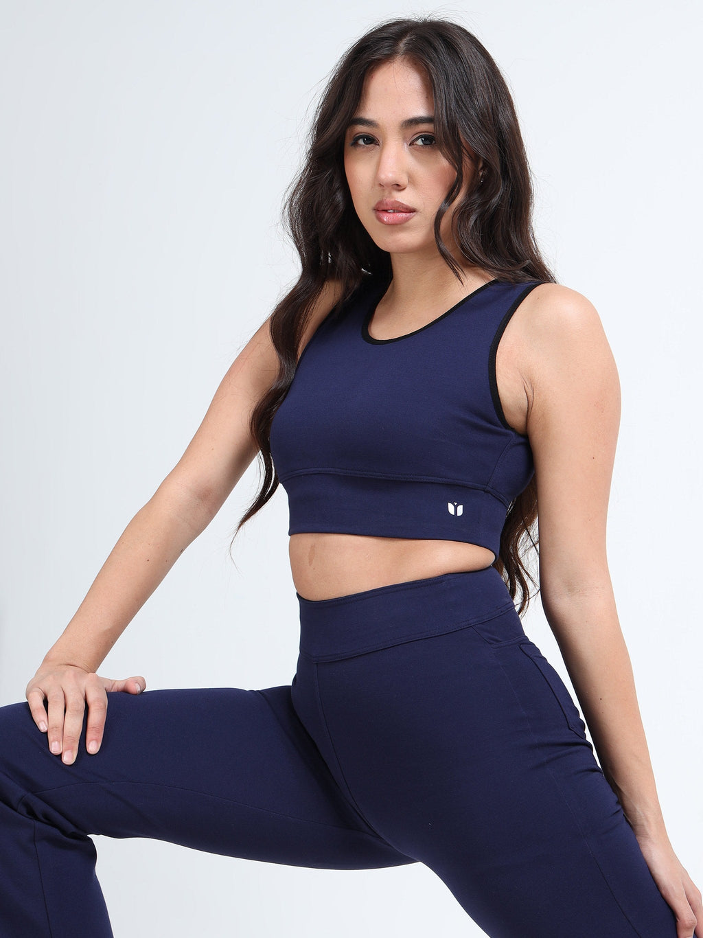 Yellowcrop navy cutout sports bra, front view showing cutout panel design