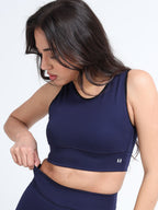 Navy cutout sports bra side view on model