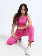 Close-up of pink cutout sports bra cutout panel and fabric detail