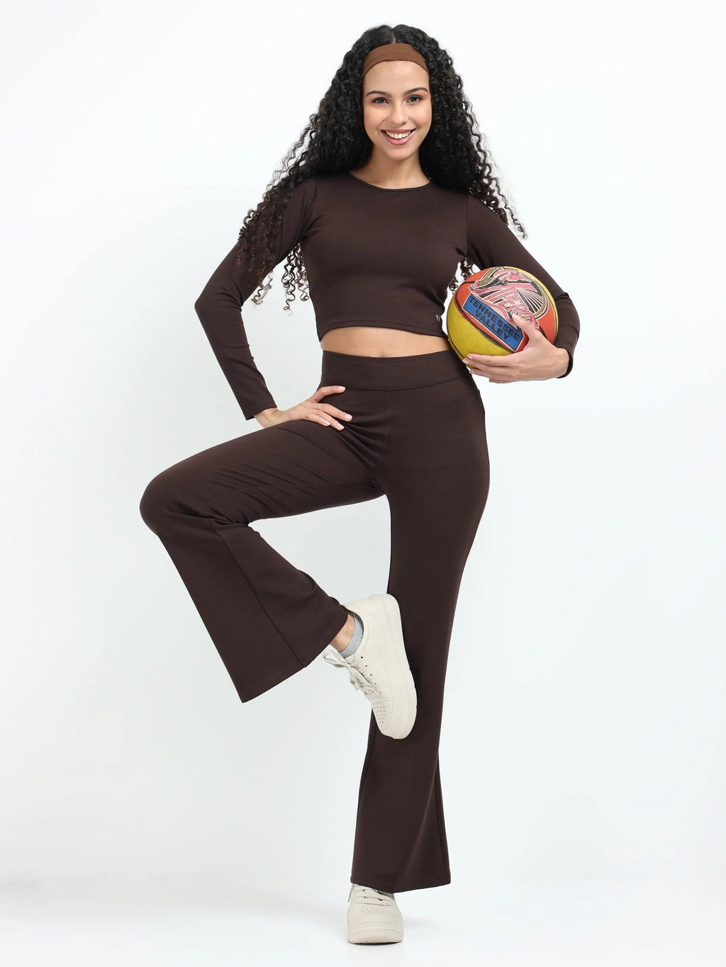 Brown flare pants full-length shot showing complete high-waisted flare silhouette
