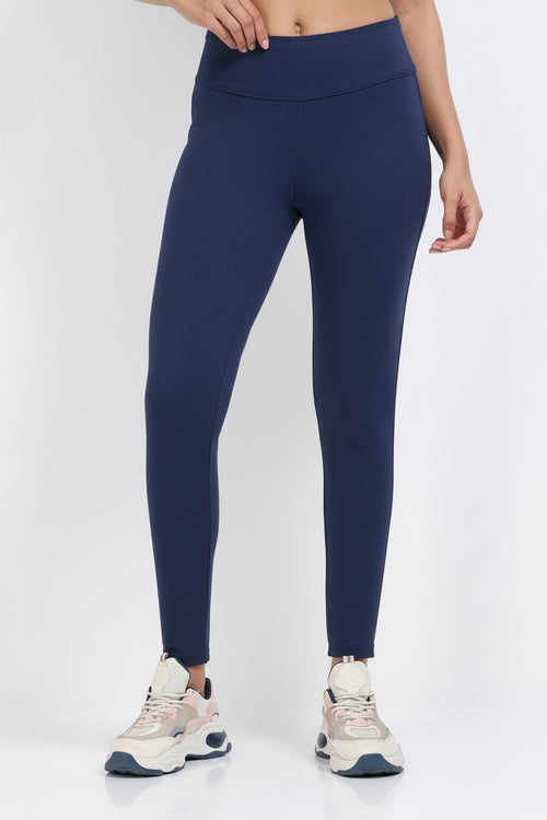 Yellowcrop navy sculpt jegging, front view showing high-rise waistband and fitted leg