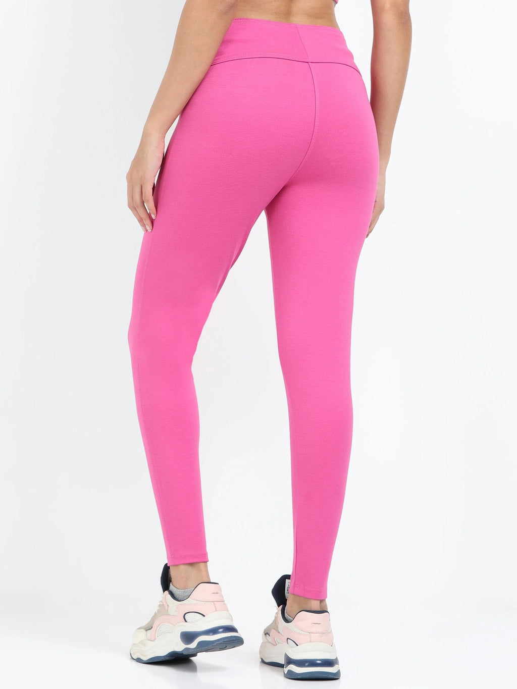 Pink sculpt jegging side view showing high-rise waist and fitted leg silhouette