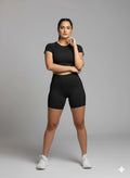Yellowcrop black athletic shorts, front view on model