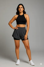 Yellowcrop gray athletic skort, front view showing pleated skirt over built-in shorts