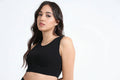 Yellowcrop black sports bra, front 3/4 view on model