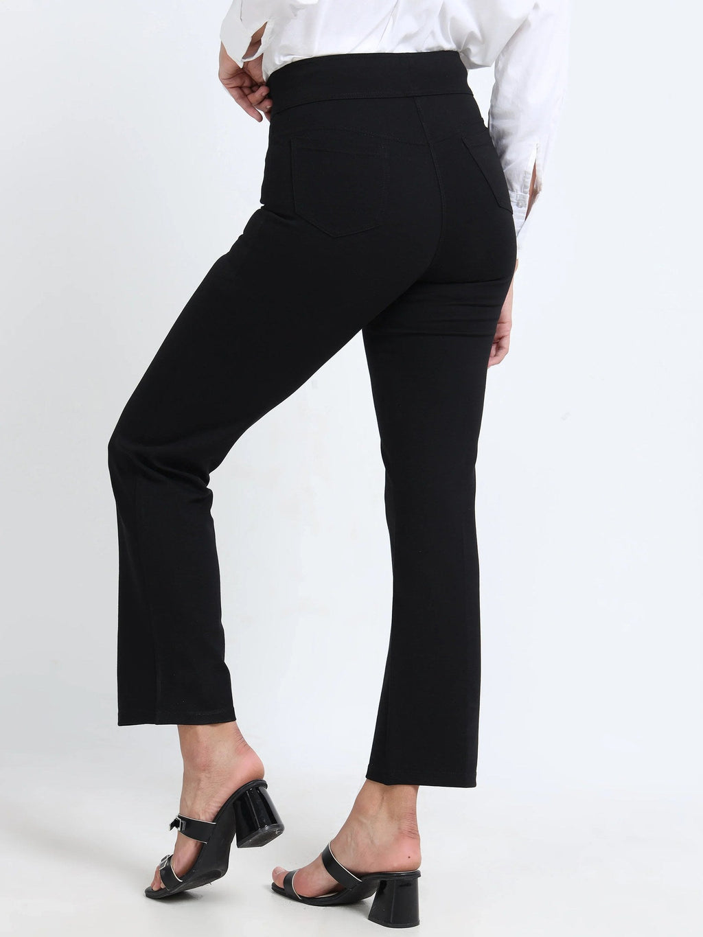 Black straight pants back view styled with white shirt