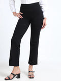 Yellowcrop black straight pants, front view styled with white shirt and block heels