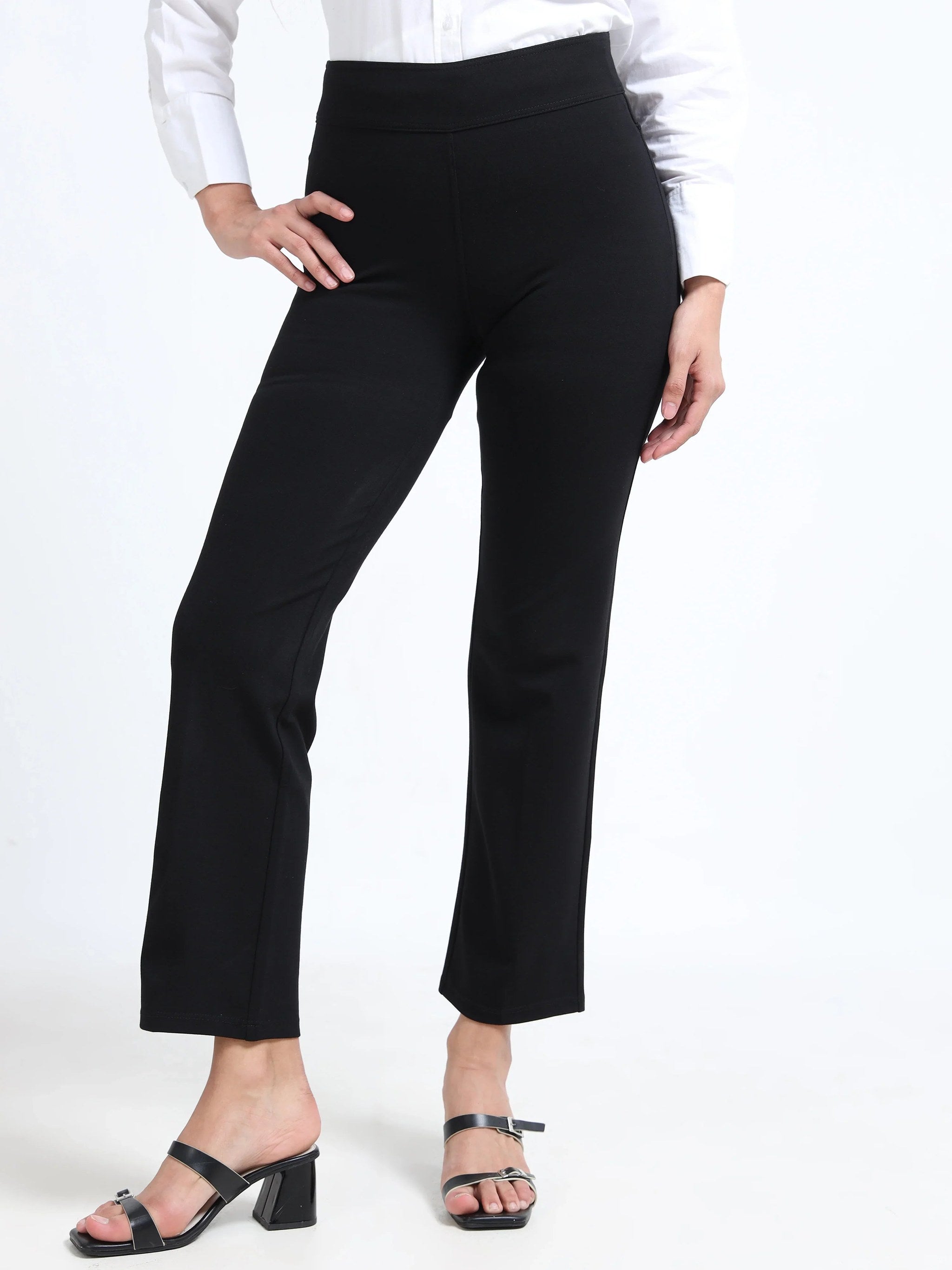 Yellowcrop black straight pants, front view styled with white shirt and block heels