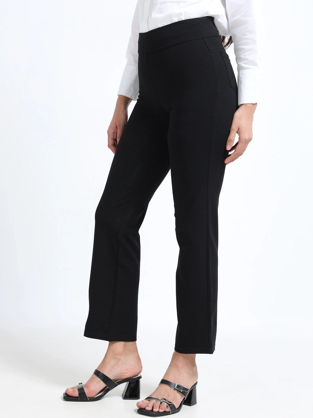 Black straight pants side view showing slim straight leg silhouette