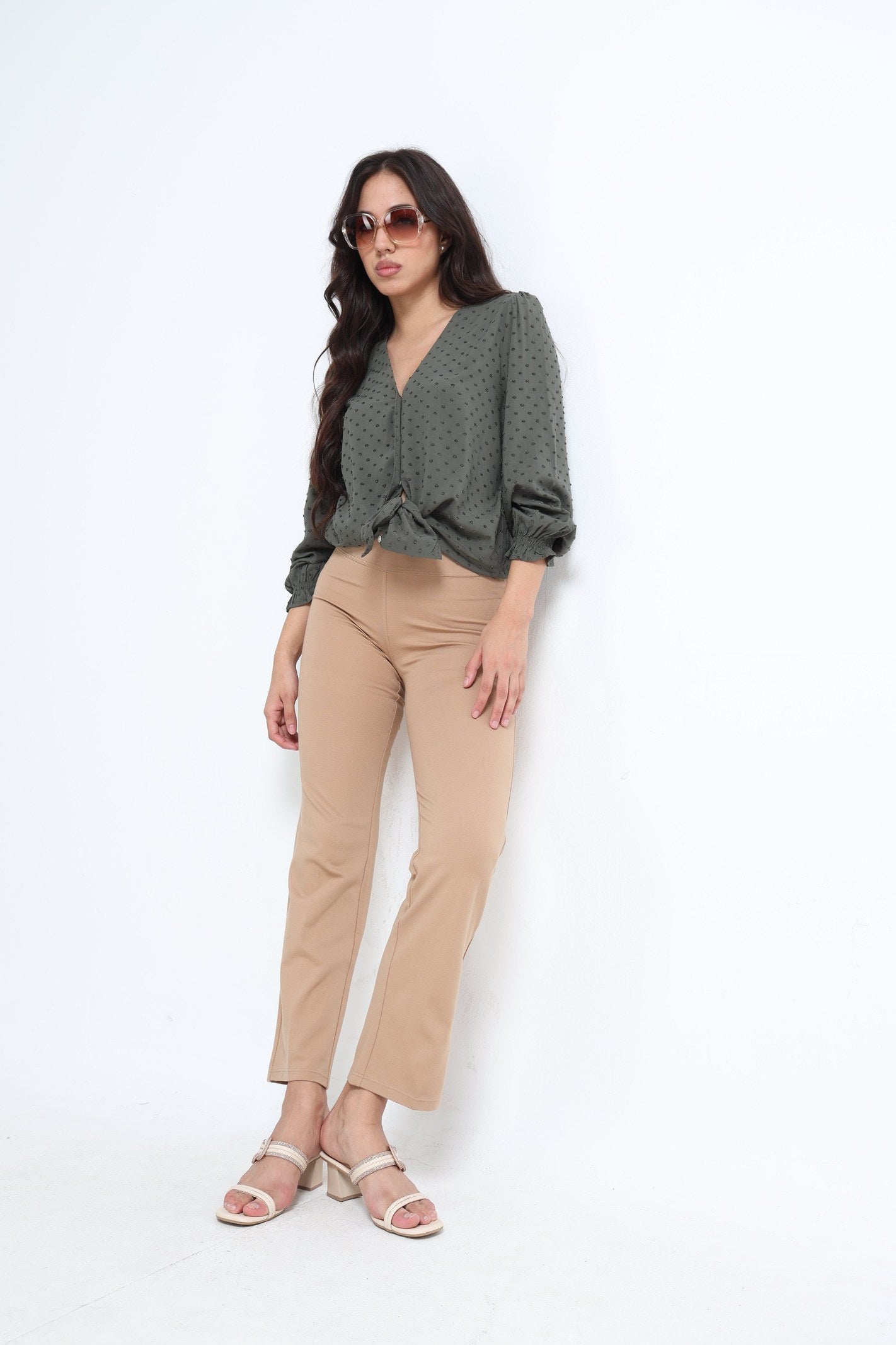 Khaki straight pants back view showing back pocket detail