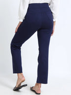Navy straight pants back view styled with white shirt