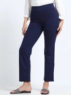 Yellowcrop navy straight pants, front view styled with white shirt and block heels